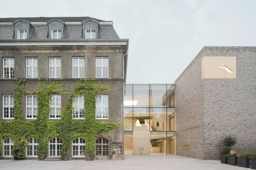 A Balance of a new modern building next to old established in europe